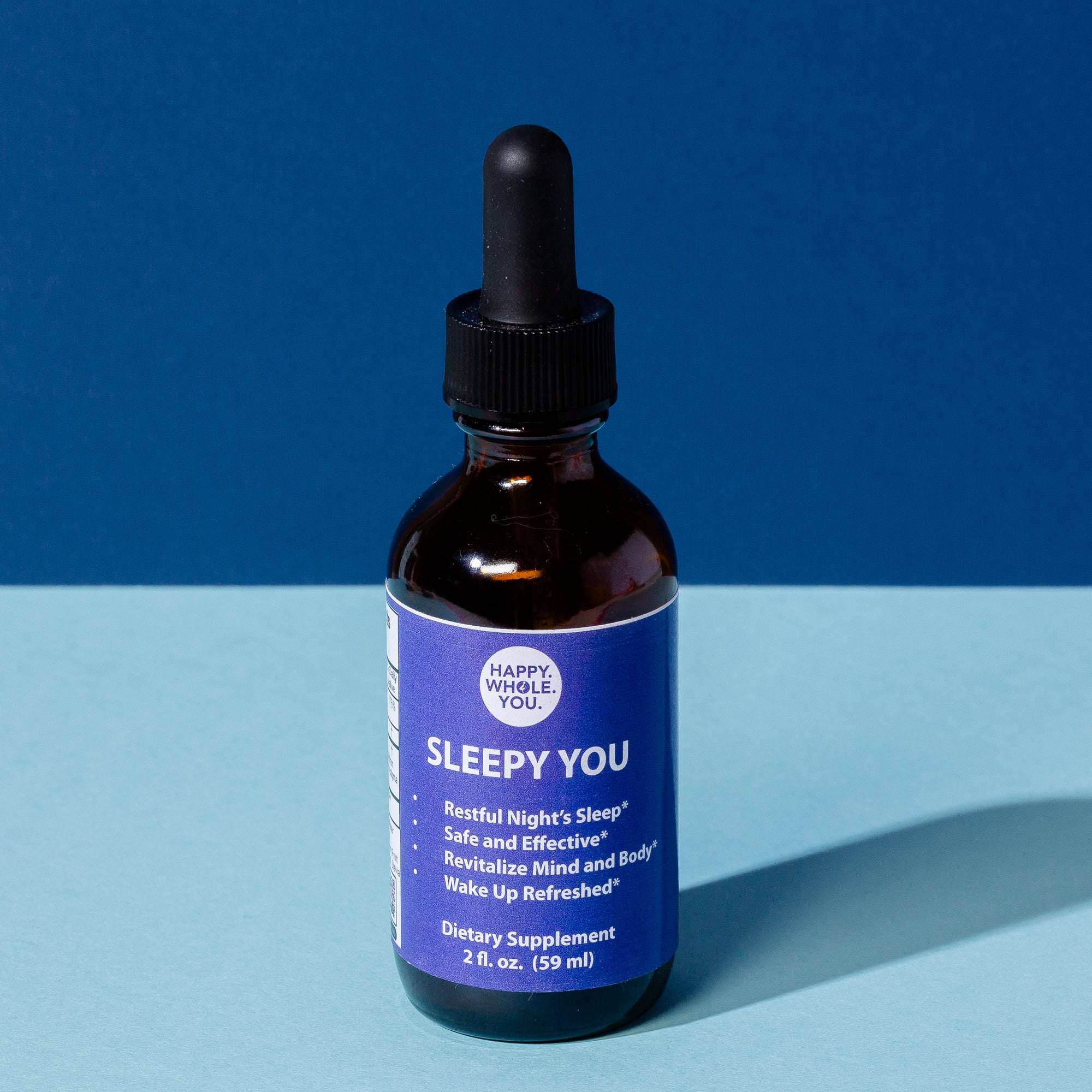 A bottle of Sleepy You Tincture for a good night sleep.